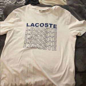 White Lacoste T-shirt.